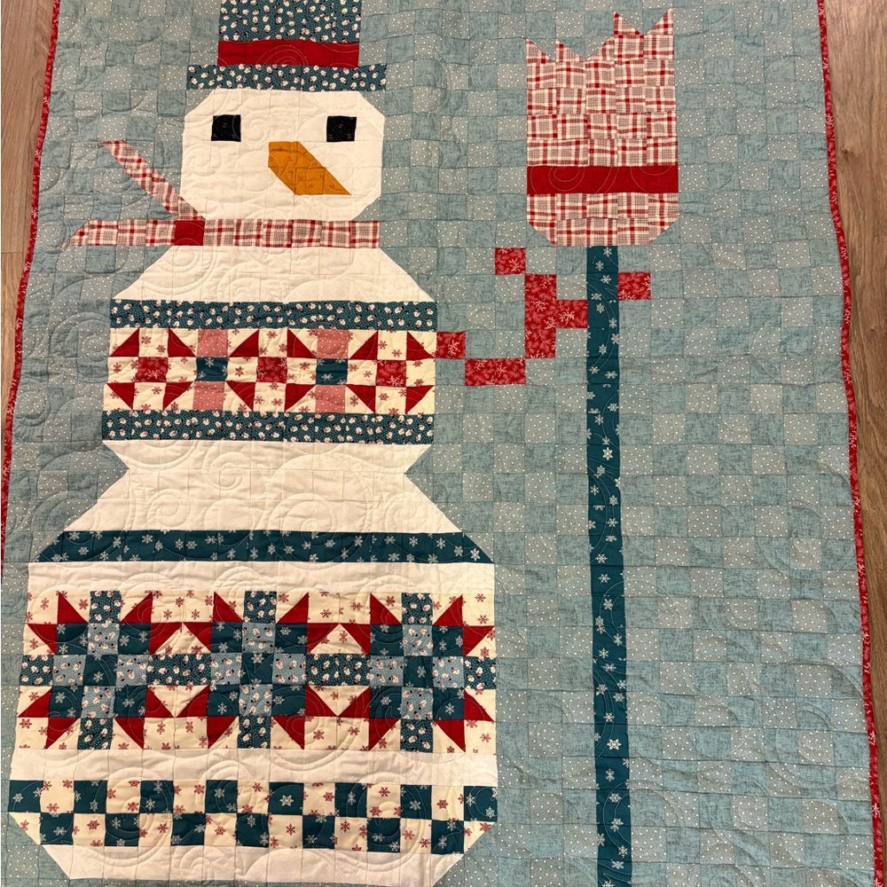 Handmade Snowman Quilt with Red and Blue Accents
